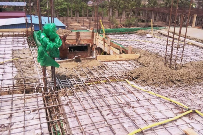 Residential and commercial building construction by M/s. M. Construction in Kolkata